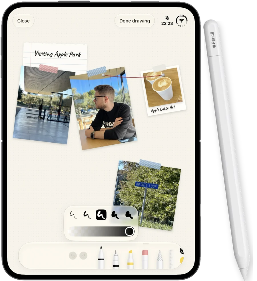 A journal page with photos, tape and a handwritten note, next to an Apple Pencil